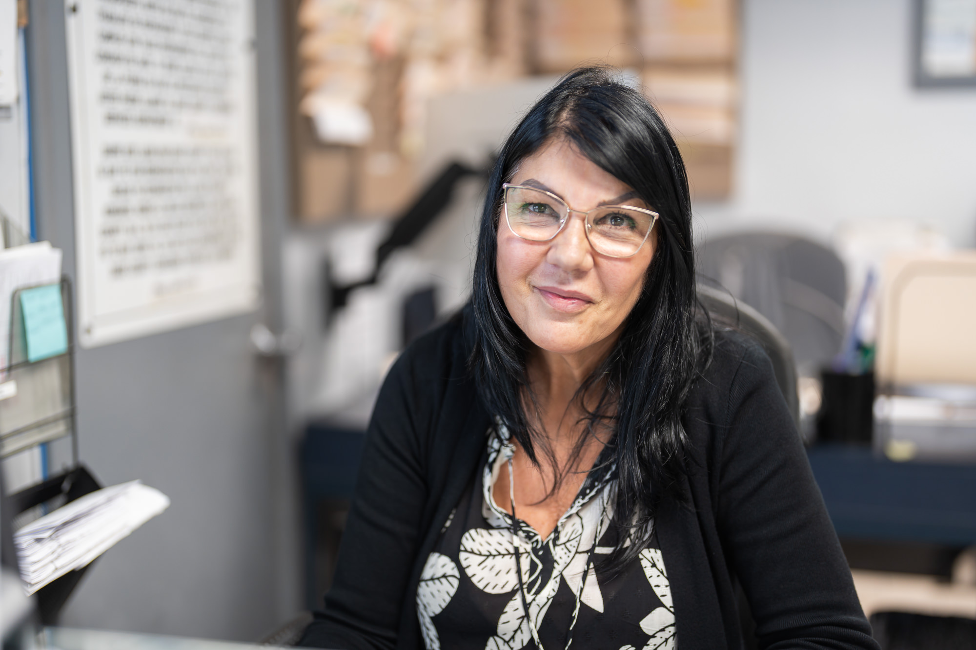 Friendly customer service representative at Precision Paint & Body Shop Miami