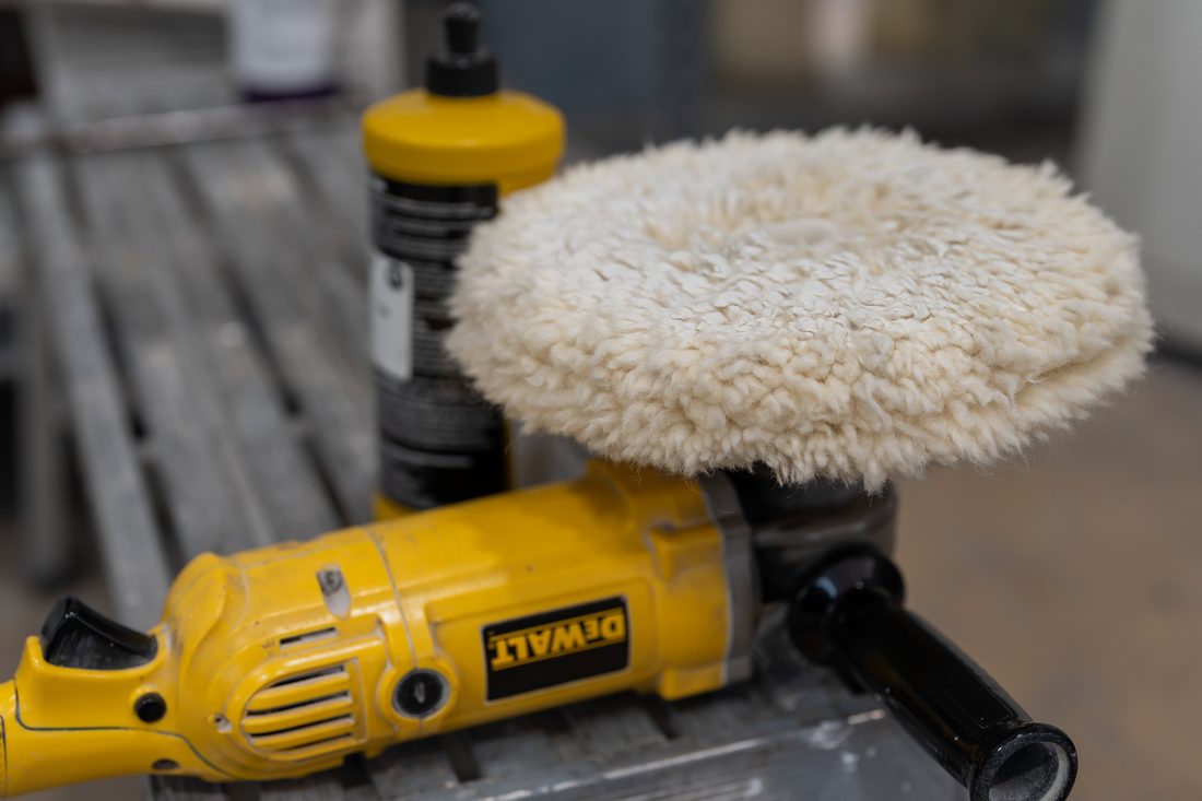 Polisher and wool pad used for the final cut and buff